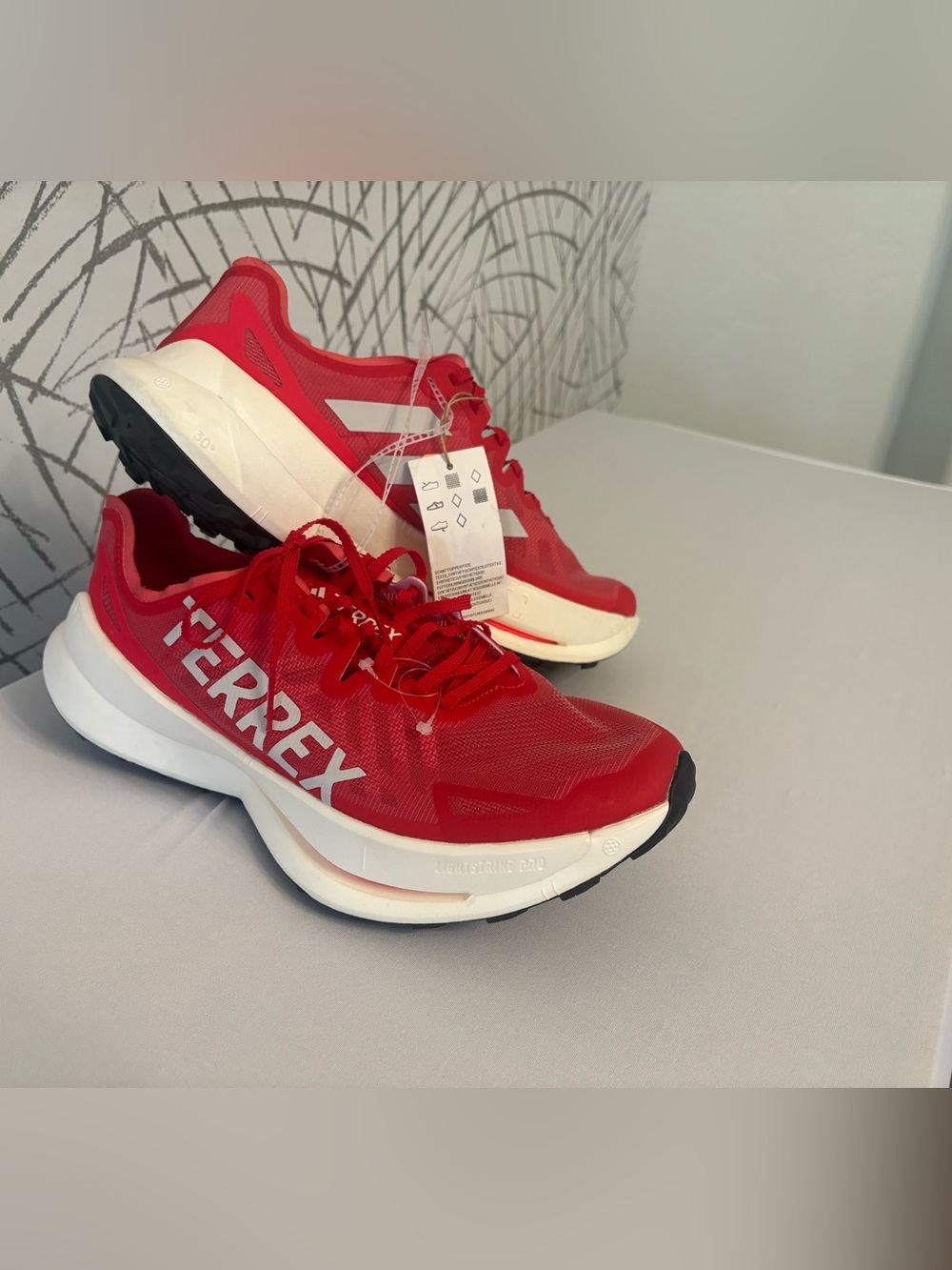 Adidas Men’s Terrex Agravic Speed Ultra trail running shoes in the "Pure Ruby